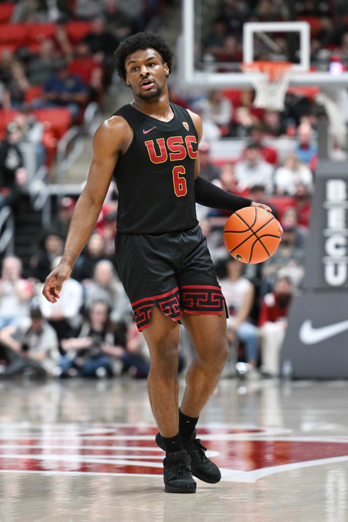 USC Trojans guard Bronny James dribbles the basketball.